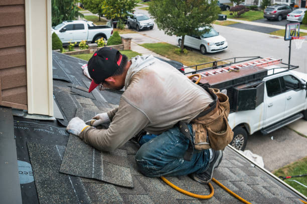 Professional Roofing technician working in Wells, ME